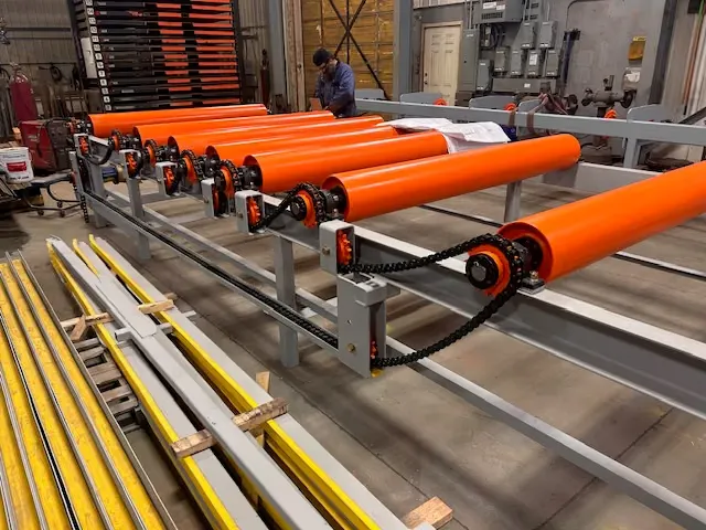Freshly fabricated orange sawmill rollcase in the Purple Springs shop